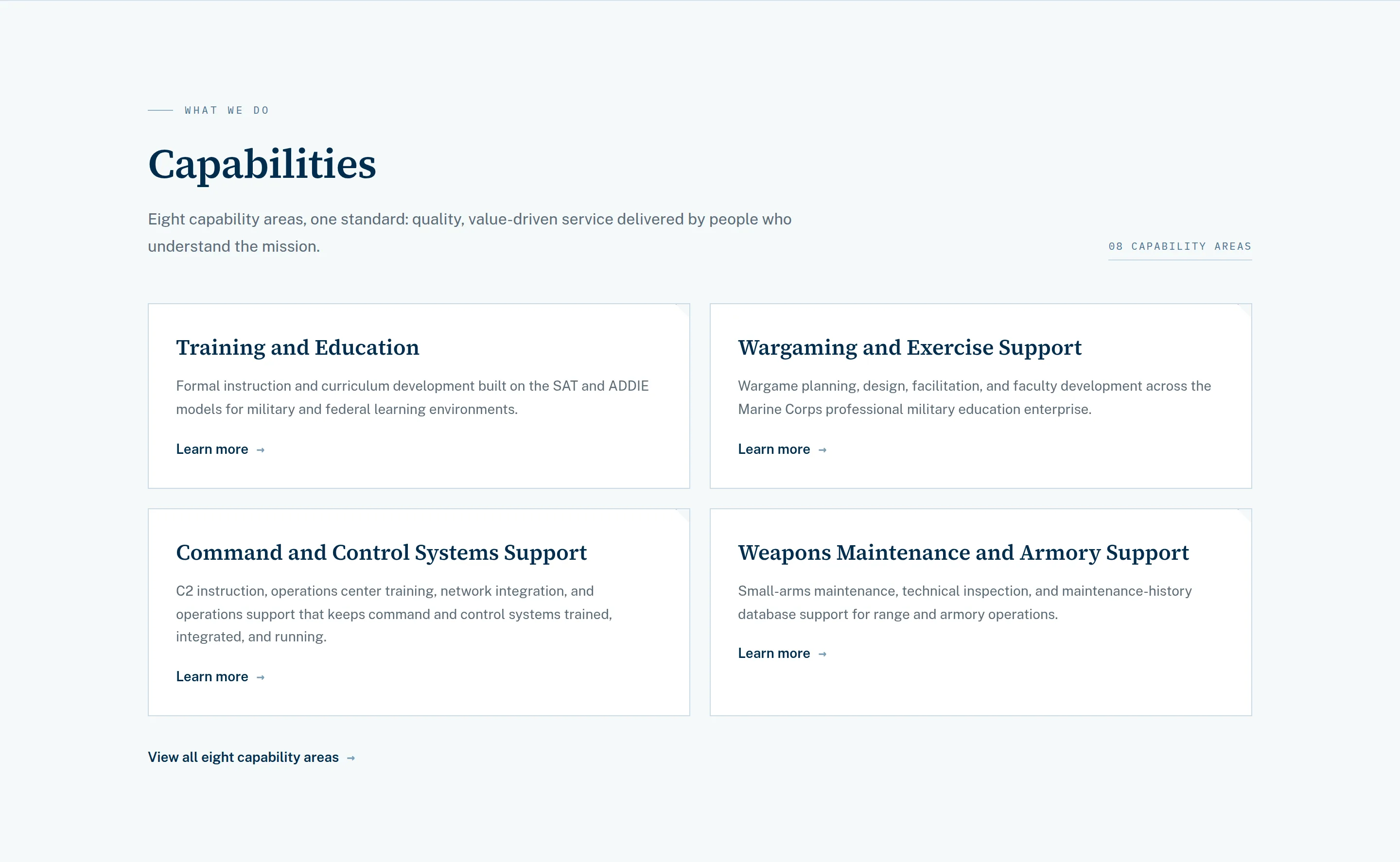 The Capabilities section of the WBSI homepage: four cards — Training and Education, Wargaming and Exercise Support, Command and Control Systems Support, Weapons Maintenance and Armory Support — each with a short description and a Learn more link.